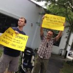 Alastair (left) and our friend Mark Erelli advertise the cause.